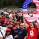 David Reinert holds up a large “Q” sign while waiting in line to see President Donald J. Trump at his rally on August 2, 2018 at the Mohegan Sun Arena at Casey Plaza in Wilkes Barre, Pennsylvania.
